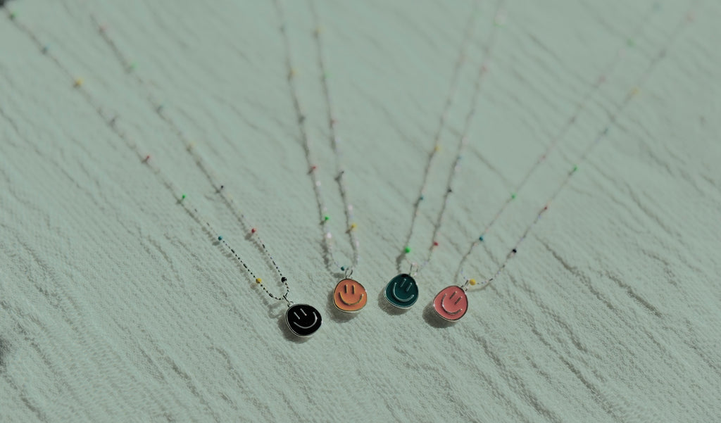 Good Vibes · Smiley-face necklace