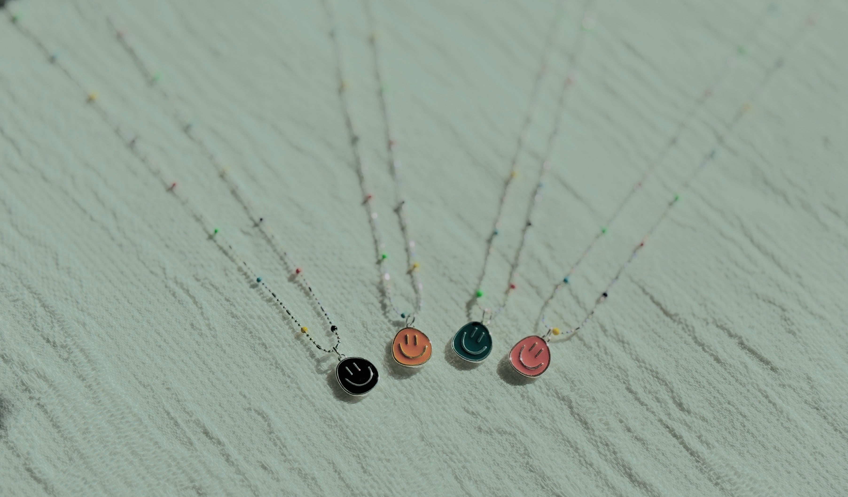 Good Vibes · Smiley-face necklace