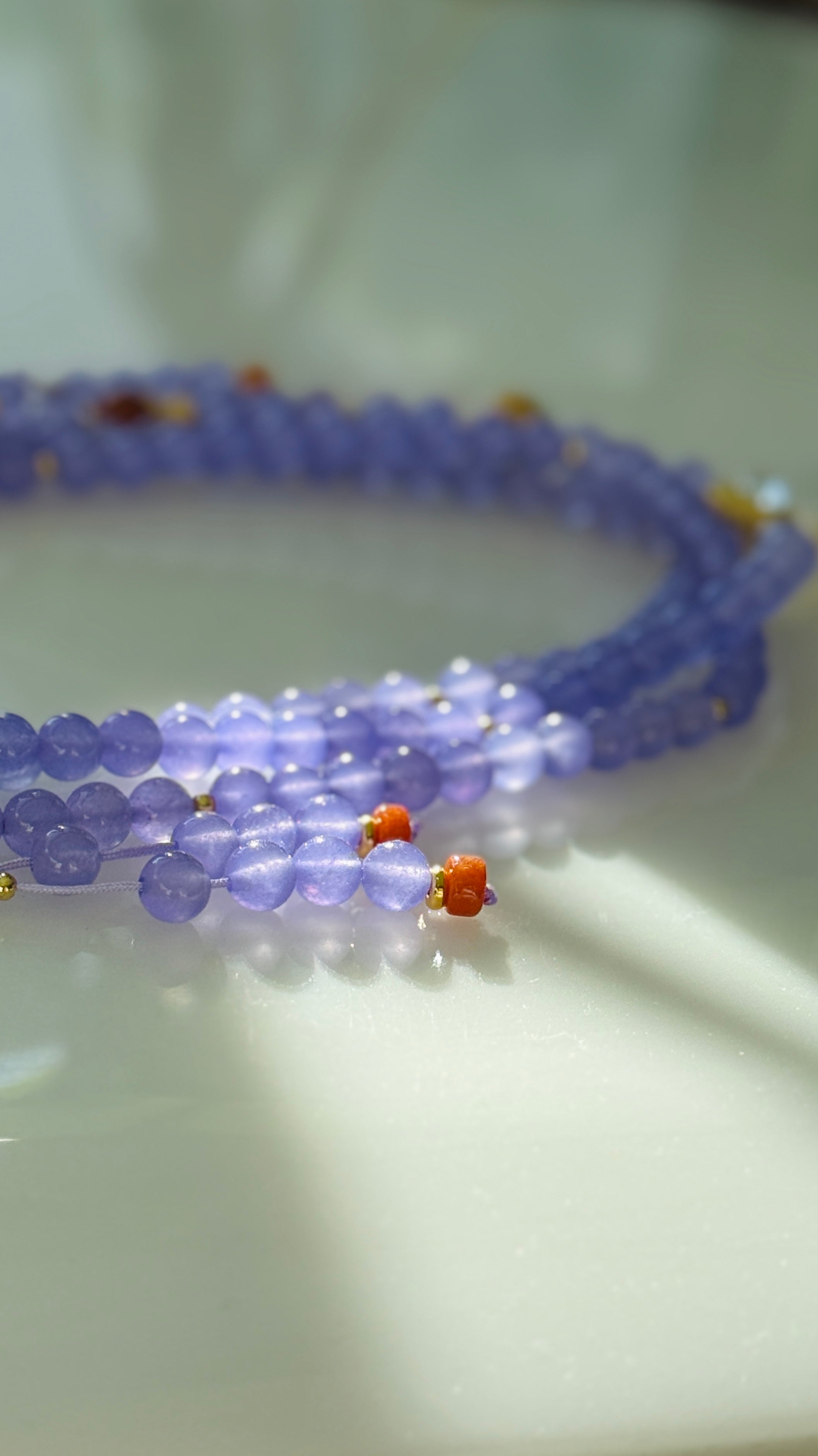 Lavender Haze · Crossbody chain with purple chalcedony beads and hand-embroidered butterfly