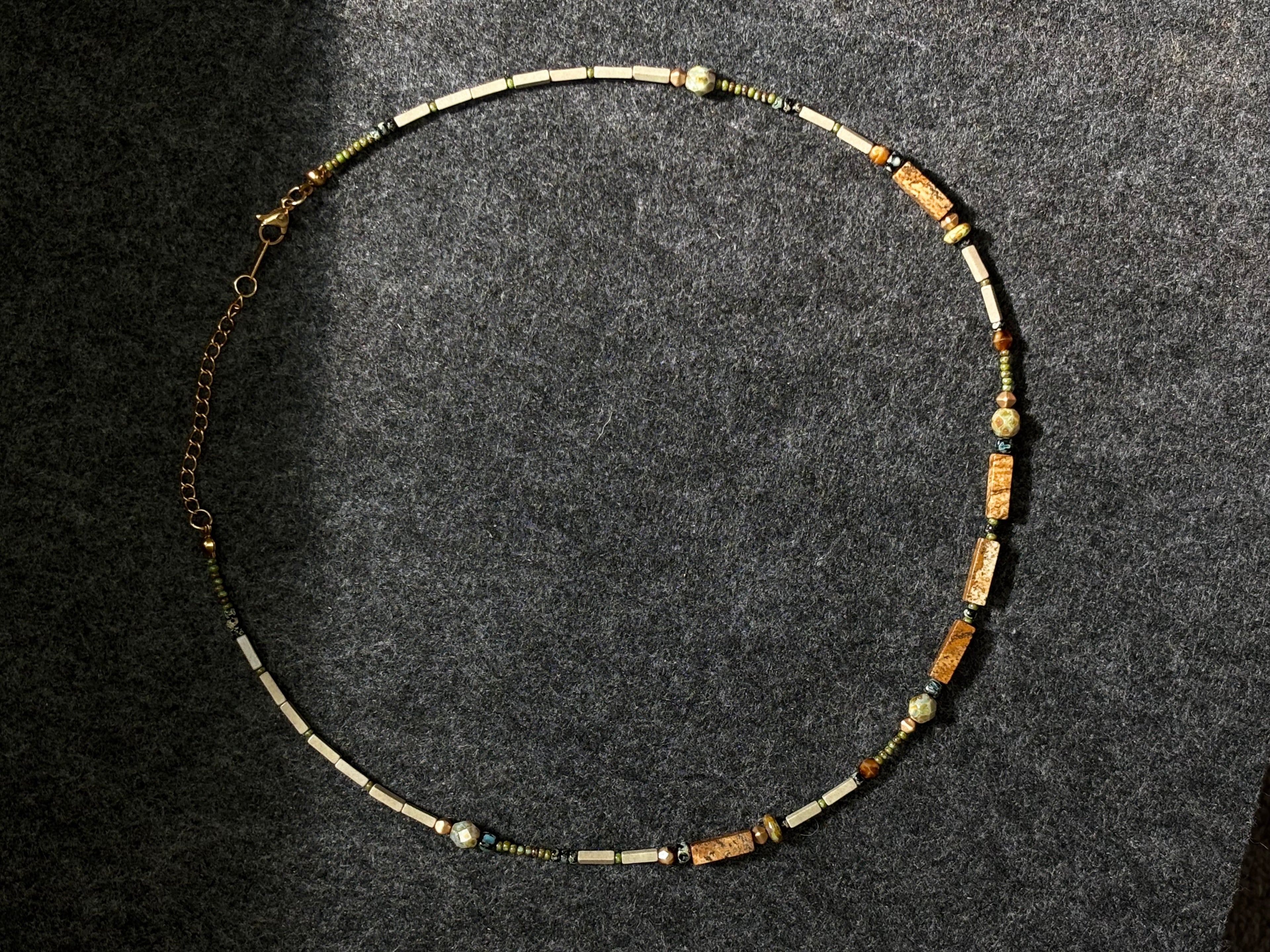 Fieldnote · Necklace reads like a line drawn through terrain