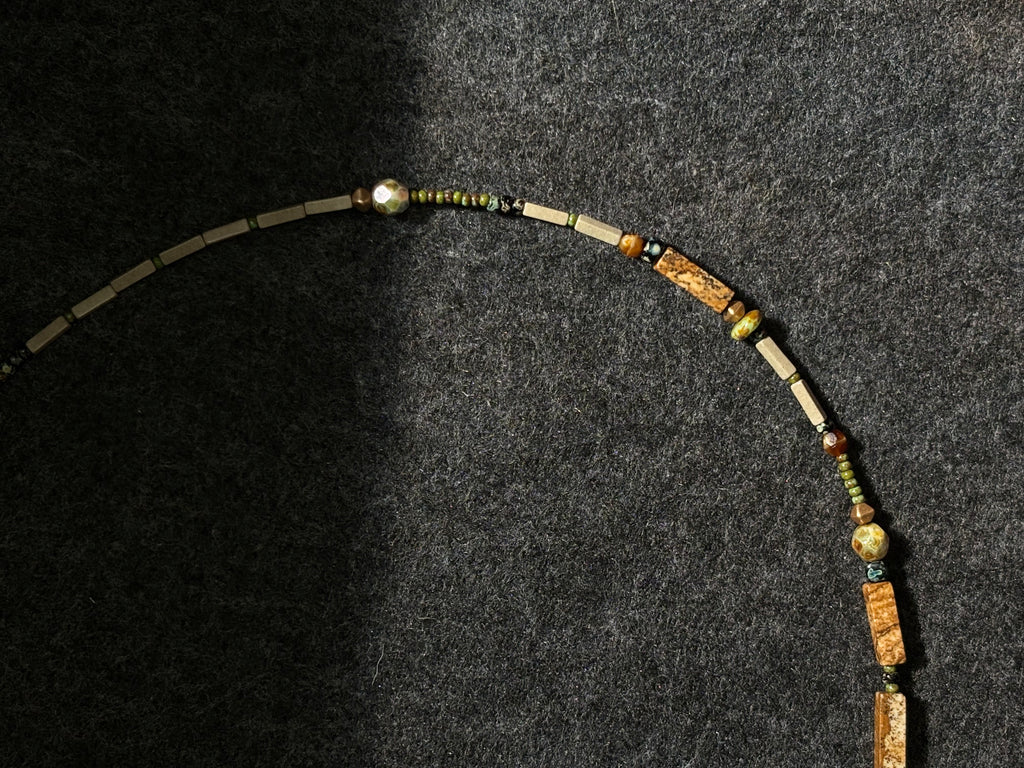 Fieldnote · Necklace reads like a line drawn through terrain