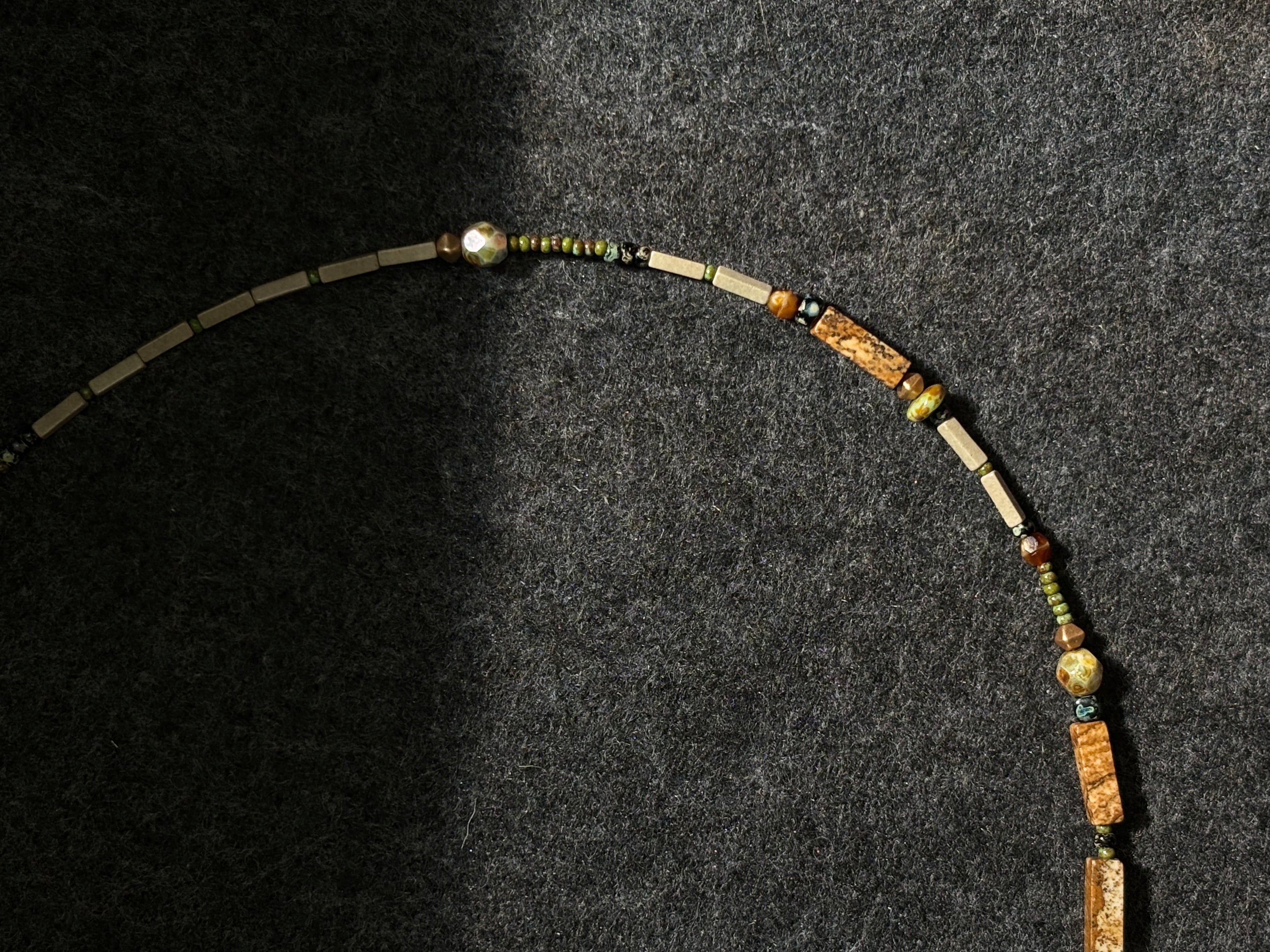 Fieldnote · Necklace reads like a line drawn through terrain