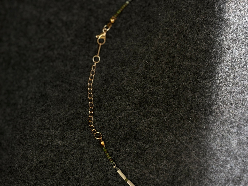 Fieldnote · Necklace reads like a line drawn through terrain