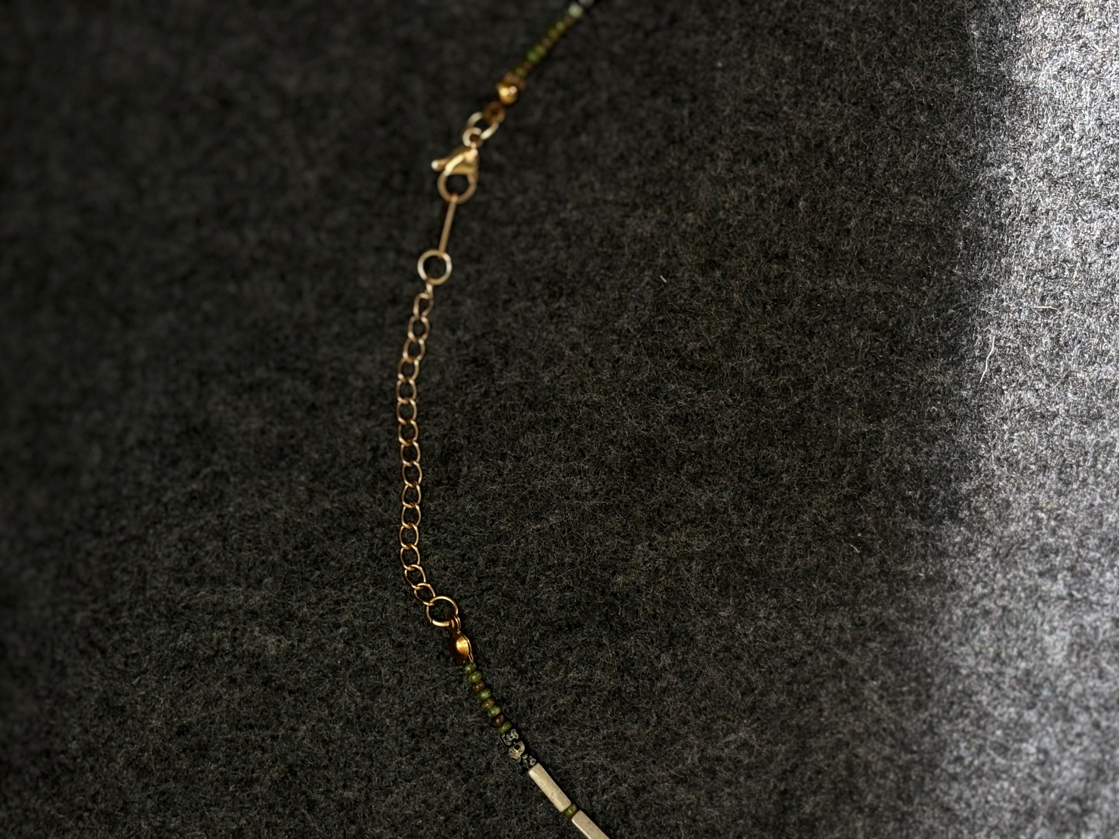 Fieldnote · Necklace reads like a line drawn through terrain