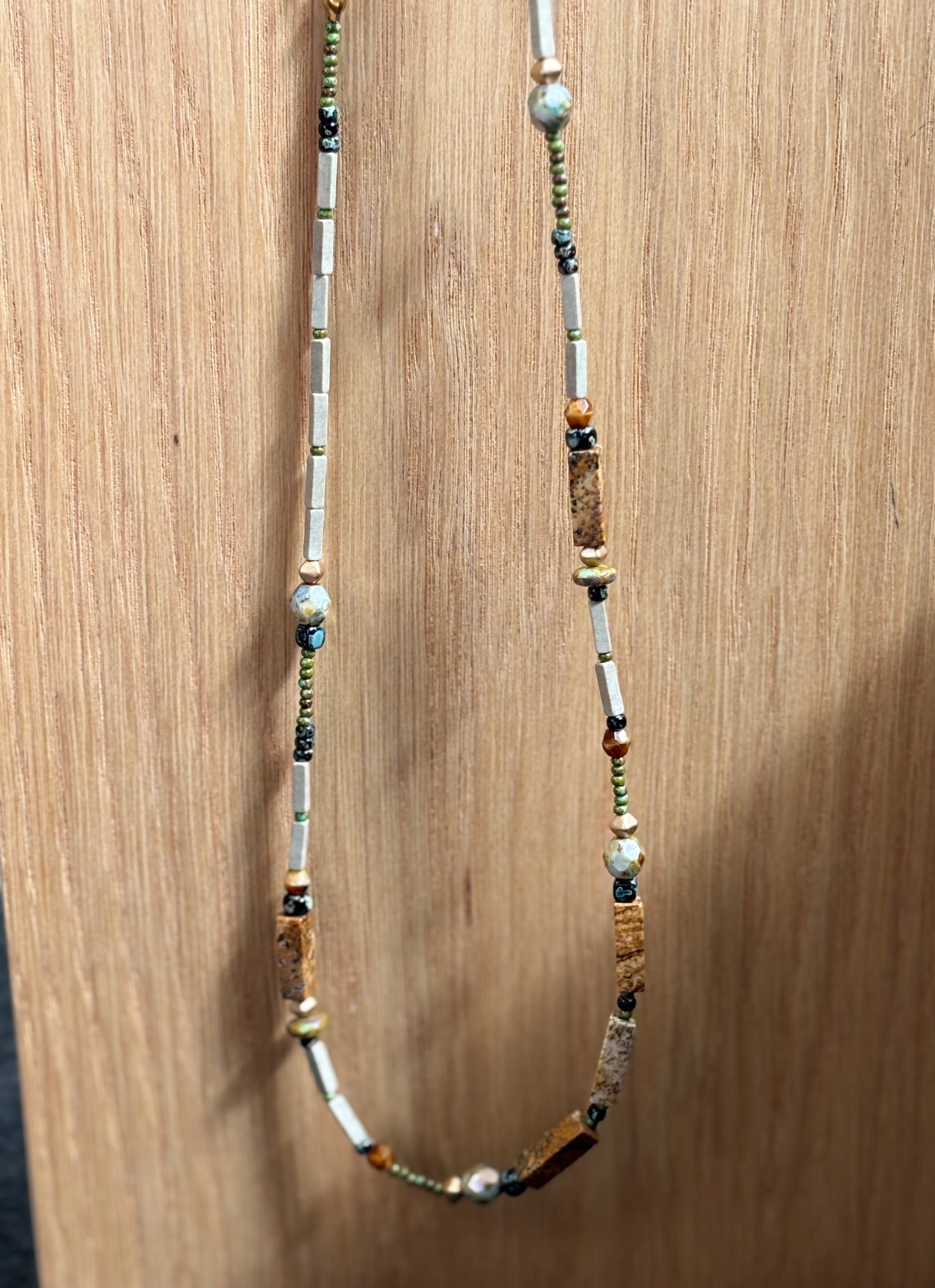 Fieldnote · Necklace reads like a line drawn through terrain