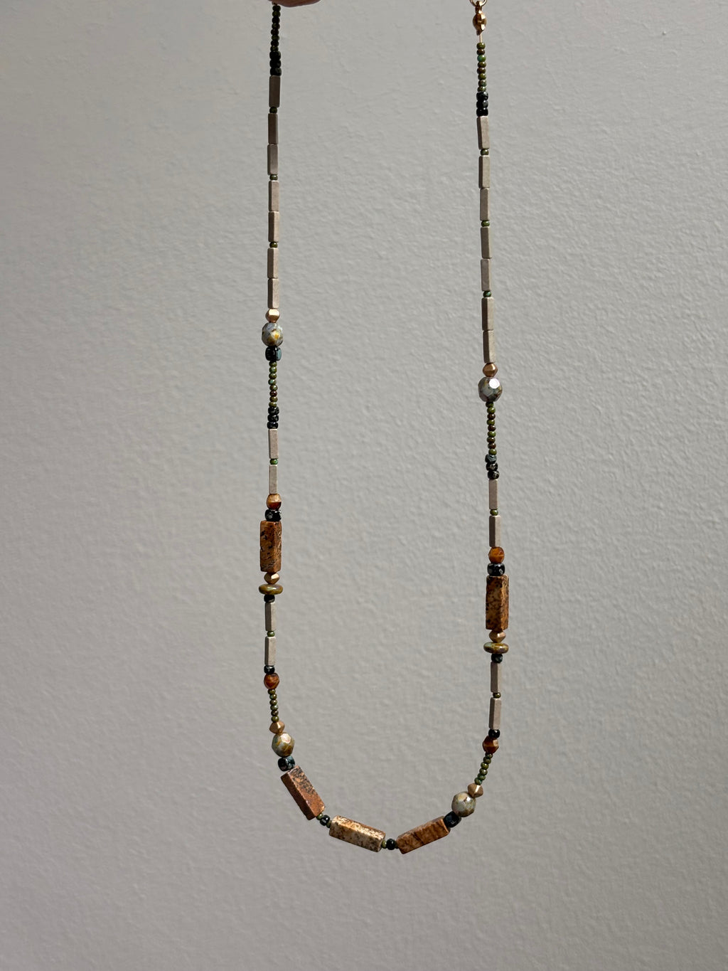 Fieldnote · Necklace reads like a line drawn through terrain