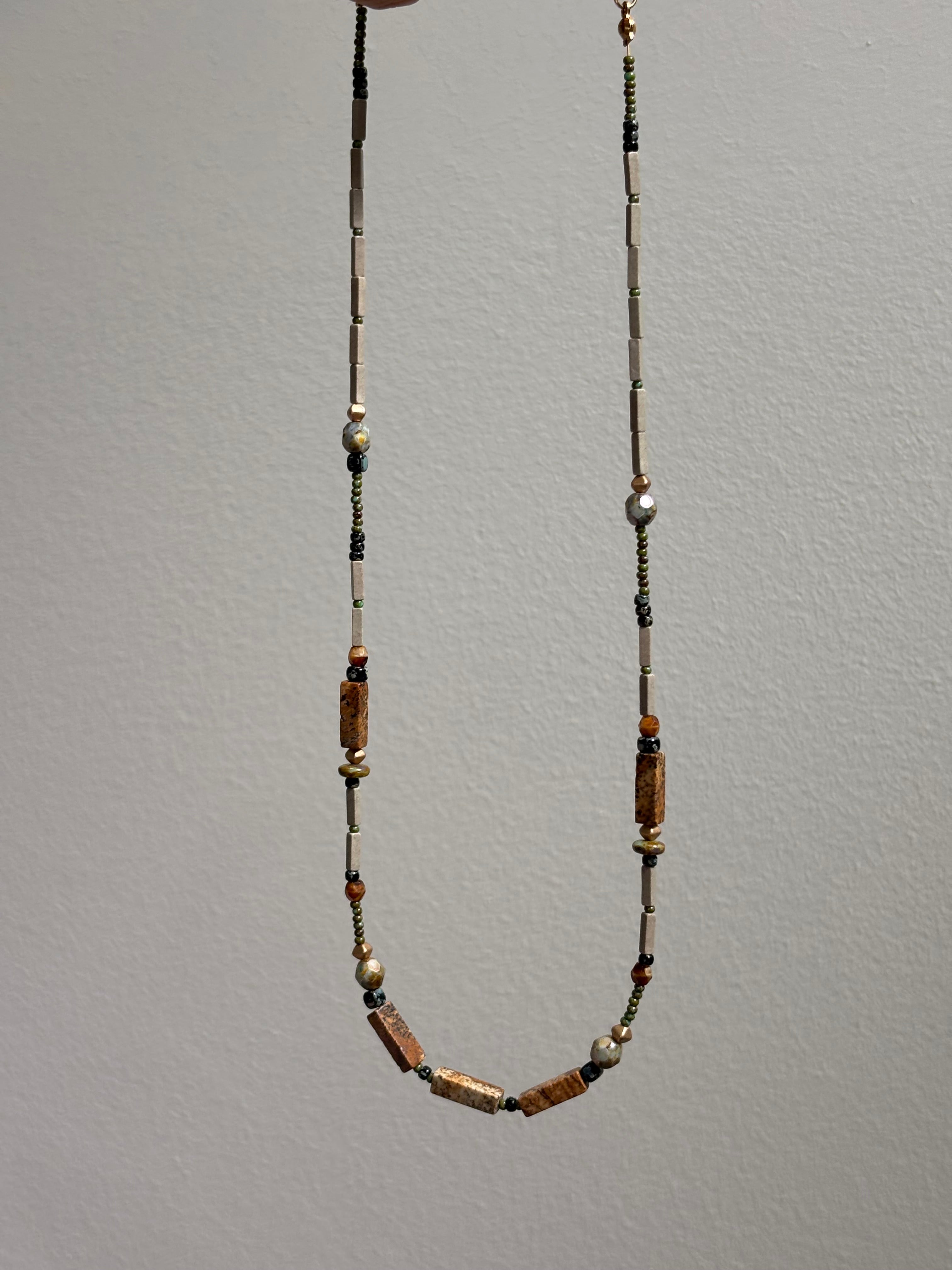 Fieldnote · Necklace reads like a line drawn through terrain