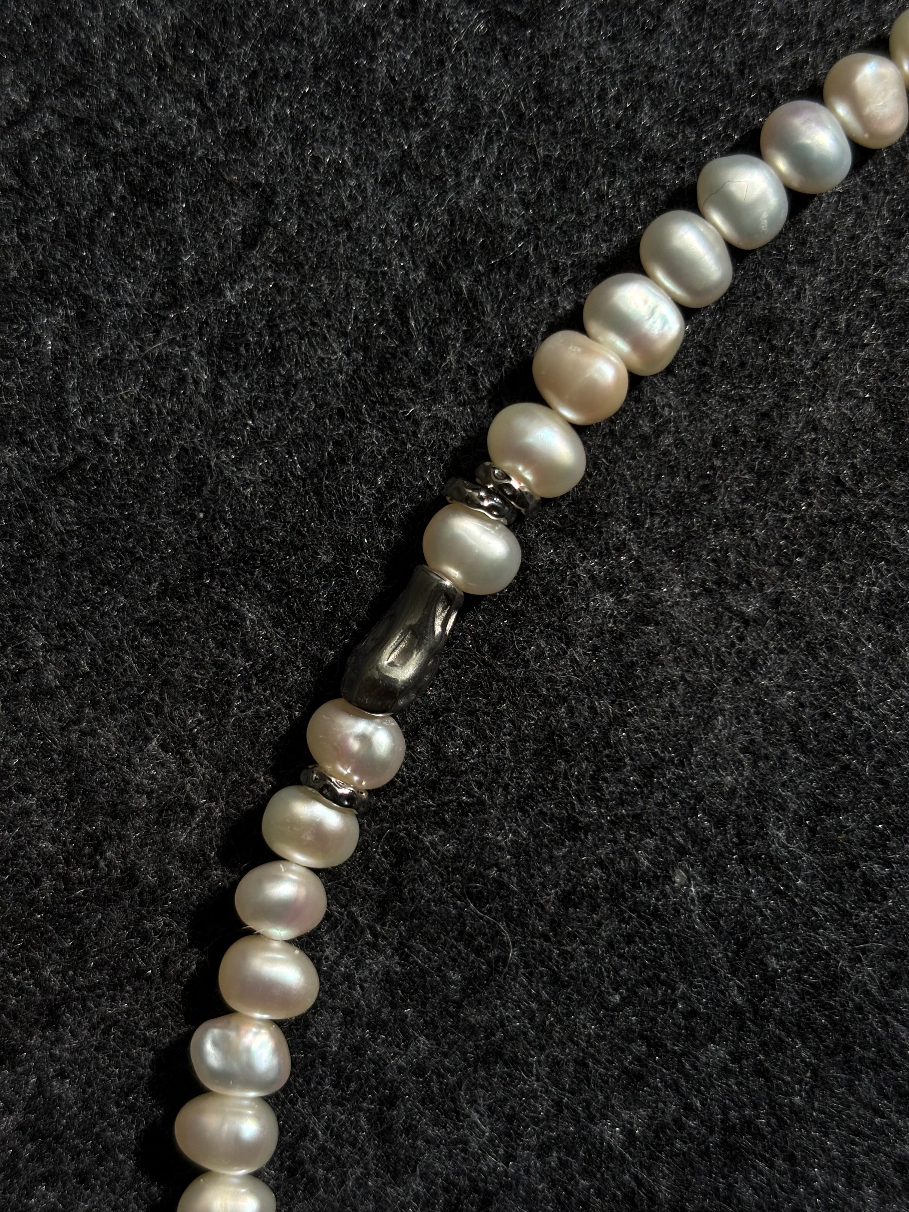 Driftline · Pearl Necklace follows the natural rhythm of light and form