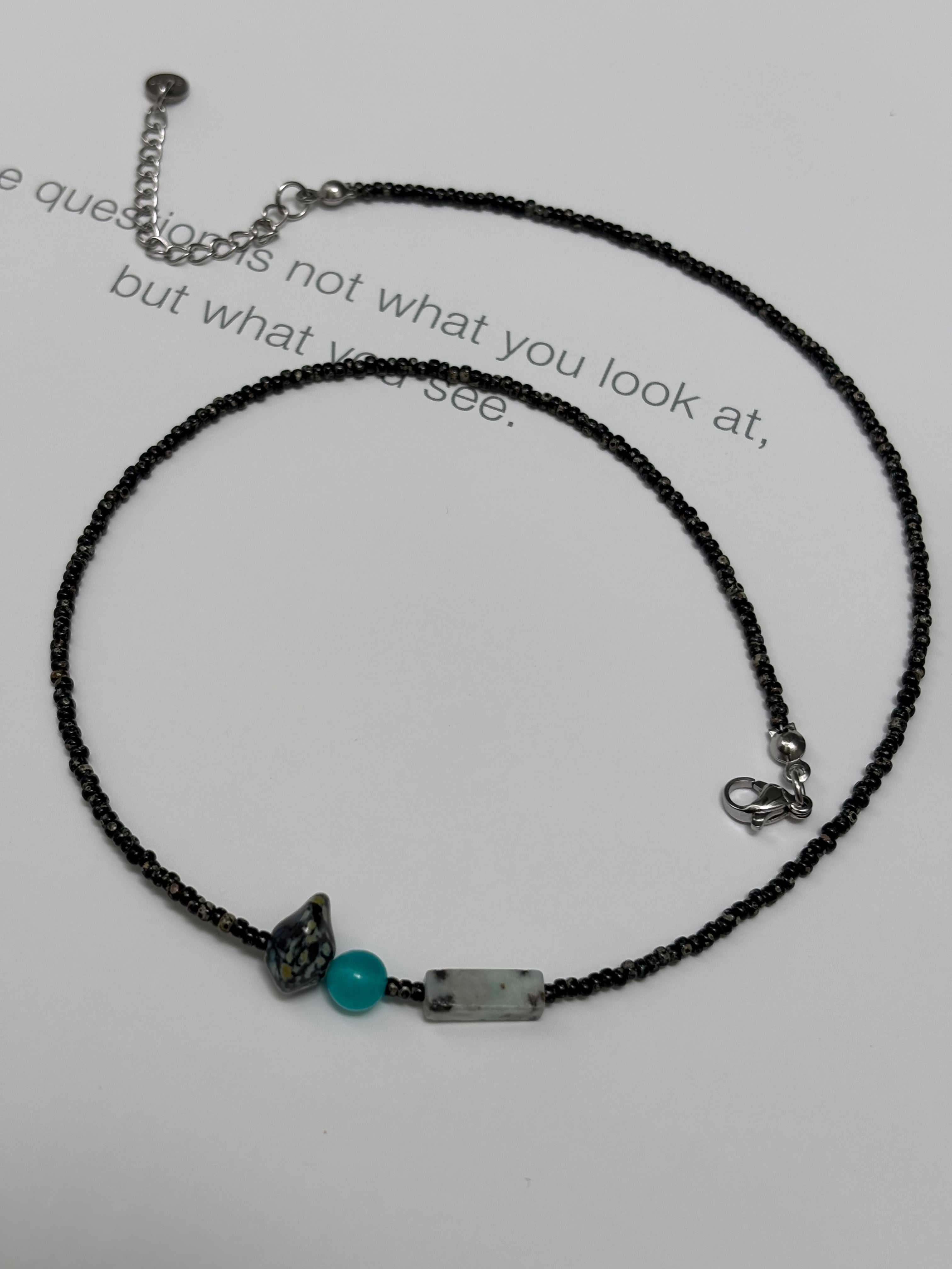 Afterglow · Necklace captures the moment when light lingers after dusk