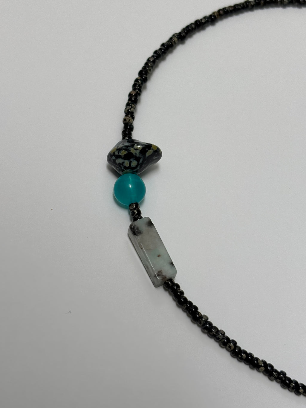 Afterglow · Necklace captures the moment when light lingers after dusk