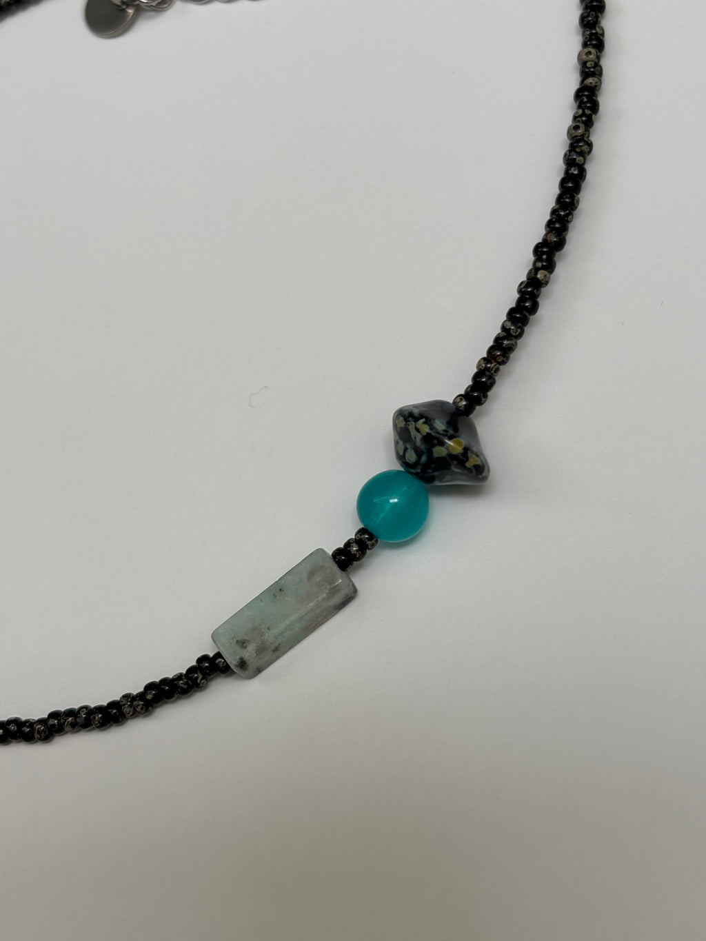 Afterglow · Necklace captures the moment when light lingers after dusk