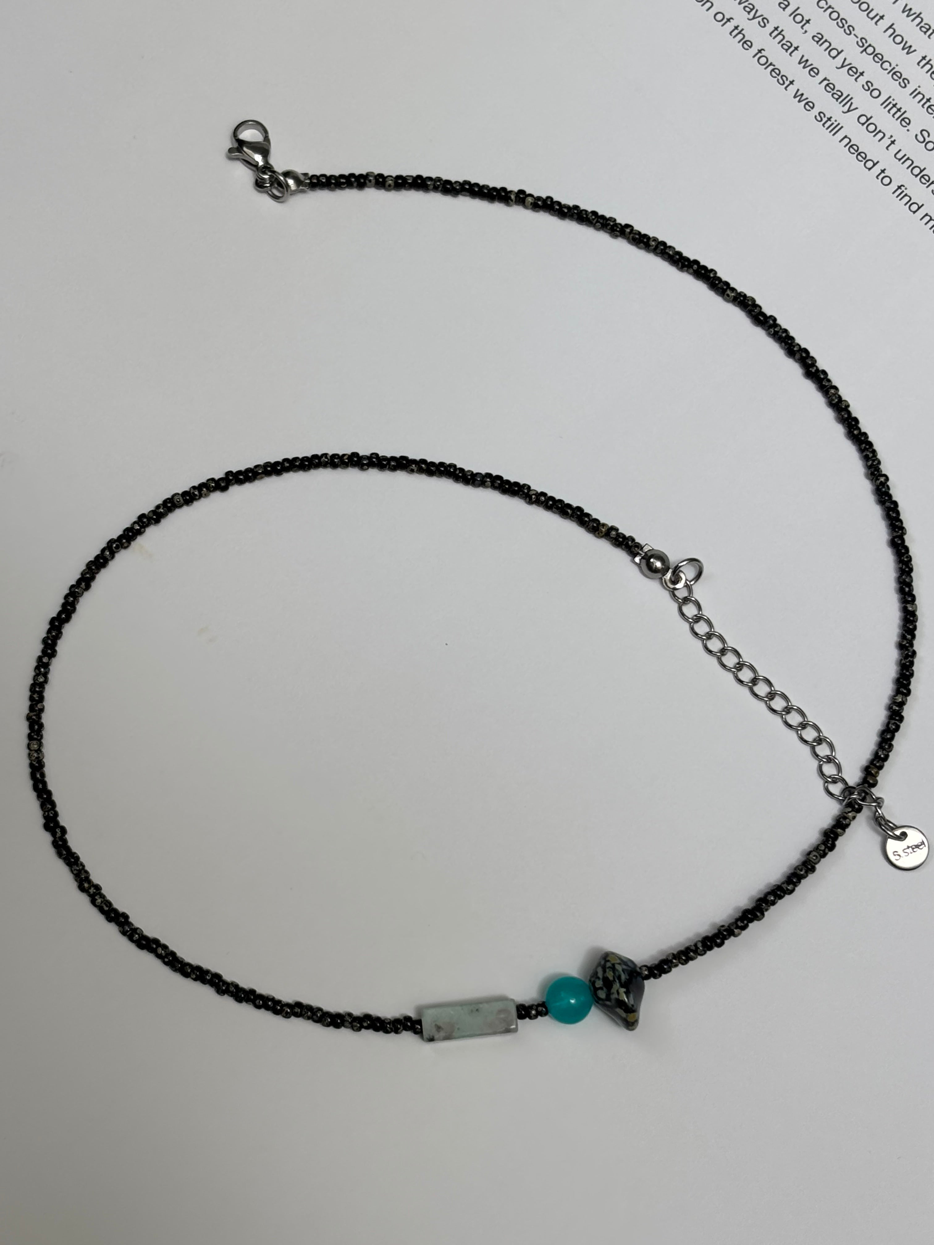 Afterglow · Necklace captures the moment when light lingers after dusk