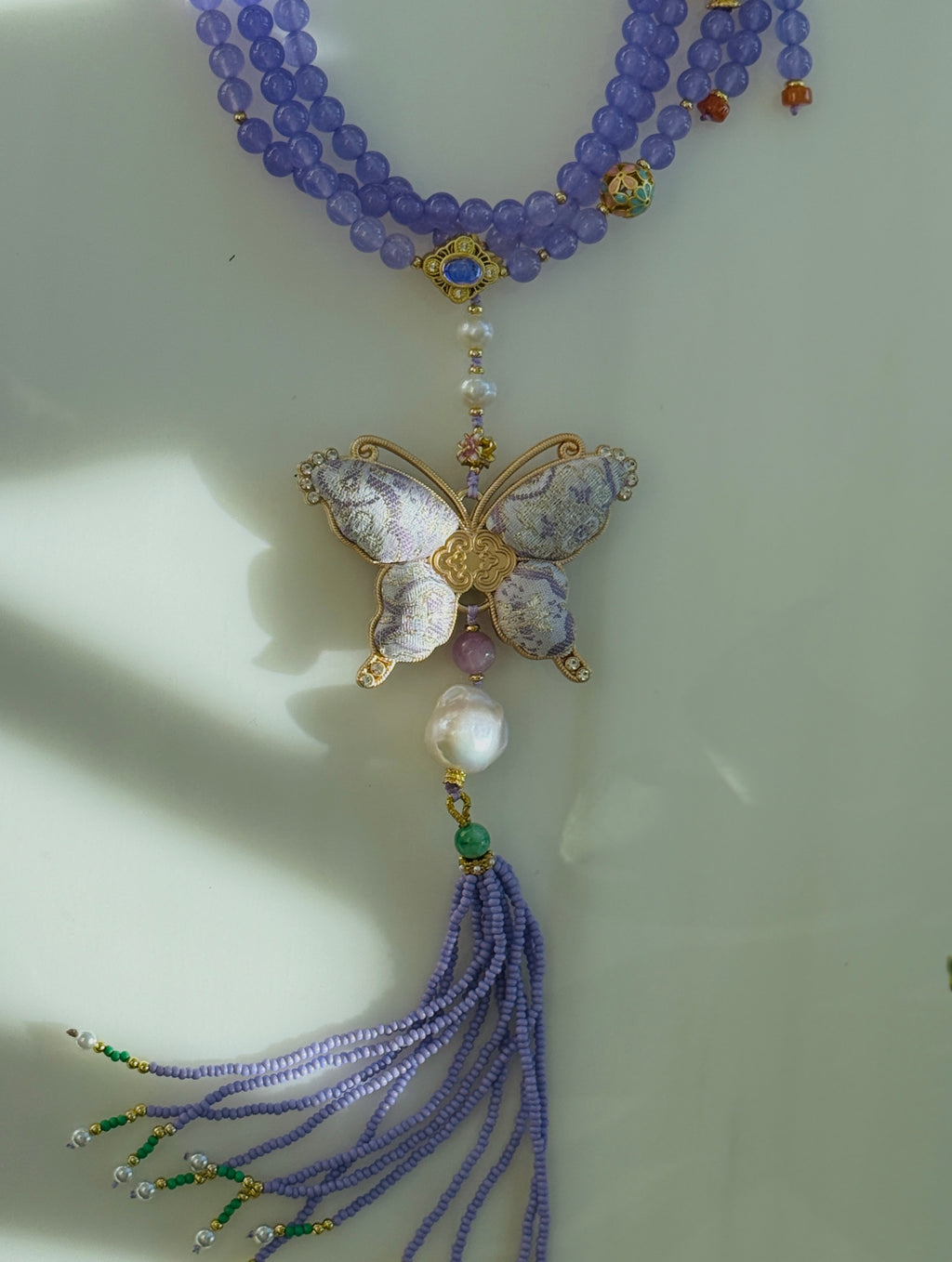 Lavender Haze · Crossbody chain with purple chalcedony beads and hand-embroidered butterfly